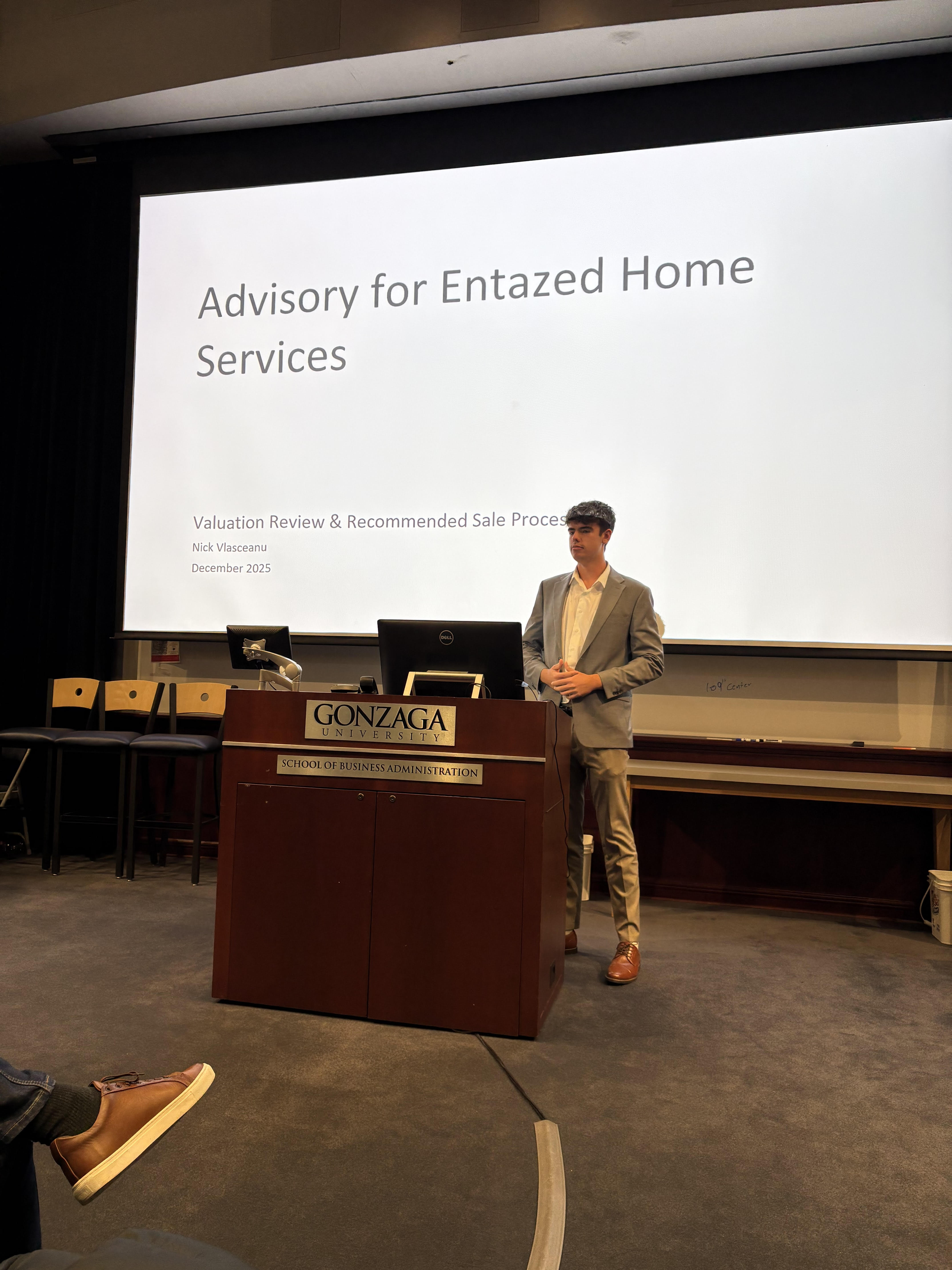Nick presenting at a Gonzaga podium